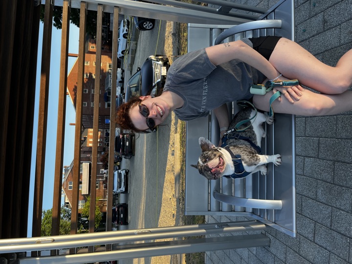 Louie on a bench swing with a friend